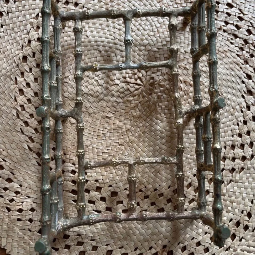Vintage gold colored bamboo style napkin or mail holder..